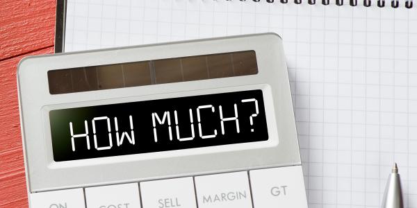 A calculator showing the words 'HOW MUCH?'. A calculator showing the words 'HOW MUCH?'.