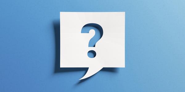 A white speech bubble box with a '?' inside against a blue background. A white speech bubble box with a '?' inside against a blue background.