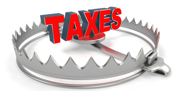 a bear trap set with the word 'TAXES' in the centre a bear trap set with the word 'TAXES' in the centre