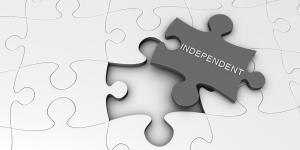 a white jigsaw missing one piece, the missing piece has the word 'INDEPENDENT' on it. a white jigsaw missing one piece, the missing piece has the word 'INDEPENDENT' on it.