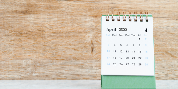 A desk calendar showing April for 2022 A desk calendar showing April for 2022