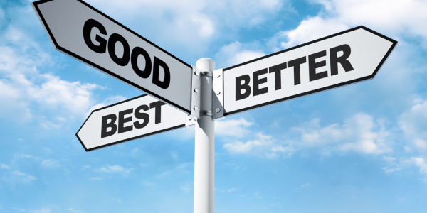 A white street pole with 3 signs coming from it saying 'GOOD', 'BETTER' and 'BEST'
