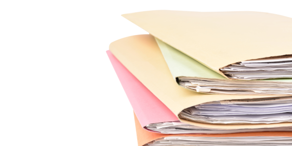 A stack of folders each containing documents A stack of folders each containing documents