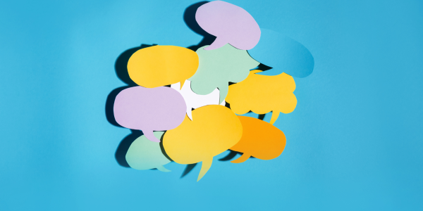 Various speech and thought bubbles on different coloured paper cut out and bundled together Various speech and thought bubbles on different coloured paper cut out and bundled together
