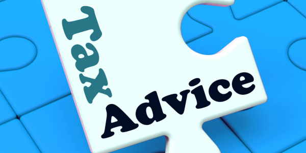 A jigsaw piece with the words 'TAX ADVICE' printed on it. A jigsaw piece with the words 'TAX ADVICE' printed on it.
