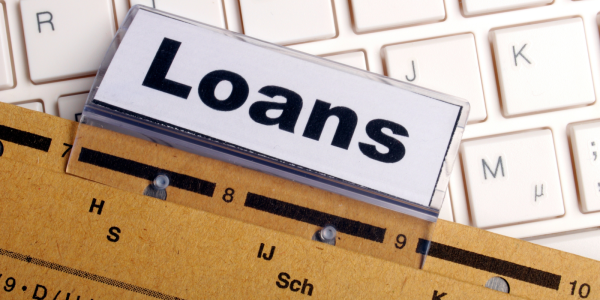 A paper file with the title of 'LOANS' A paper file with the title of 'LOANS'