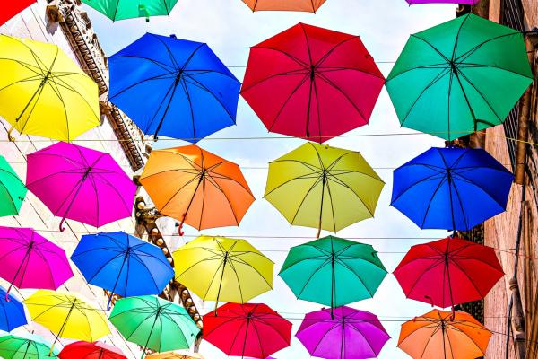 many_hanging_colourful_umbrellas