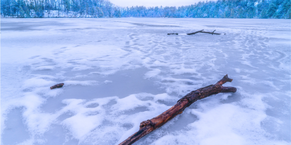 A frozen lake reaching as far as the eye can see