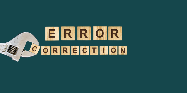 A spanner adjusting wooden letter tiles, the letter tiles spell out the words 'ERROR CORRECTION' 