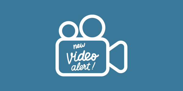 A camcorder shape outlining the words 'NEW VIDEO ALERT!'