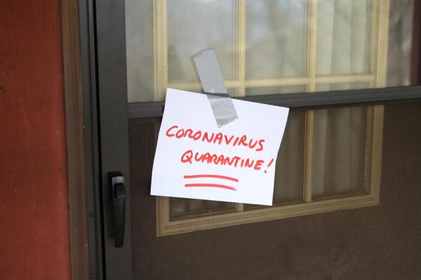 coronavirus quarantine sign on a door