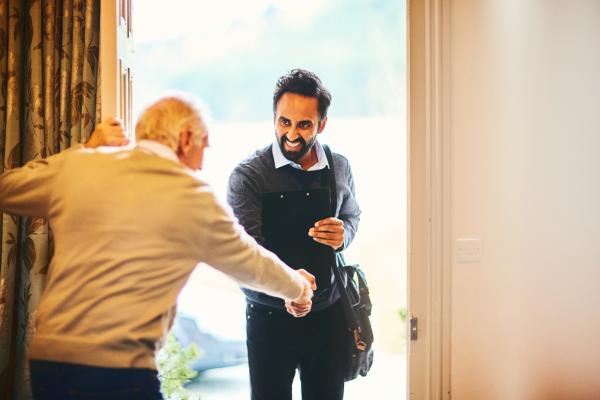 Carer and elderly man