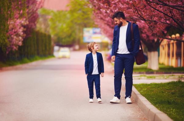 child and man dressed the same