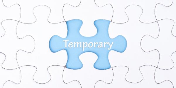 Temporary written on a jigsaw piece to represent temporary workers and job retention scheme (c) Shutterstock / JeJai Images